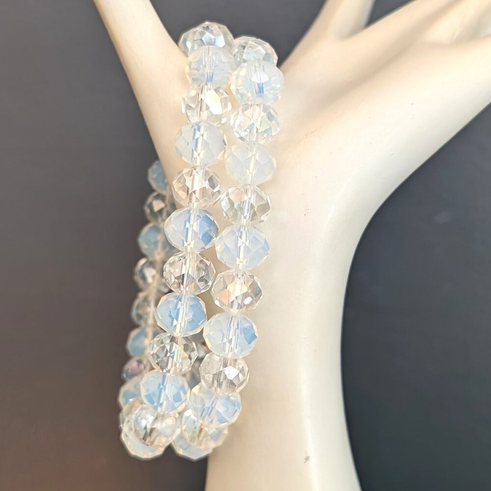 2 faceted clear and milky glass stretch bead bracelets